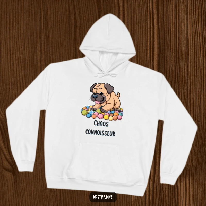 Funny Energetic Mastiff Hoodie showcasing an enthusiastic dog joyfully digging through a mound of colorful balls with a wide smile.