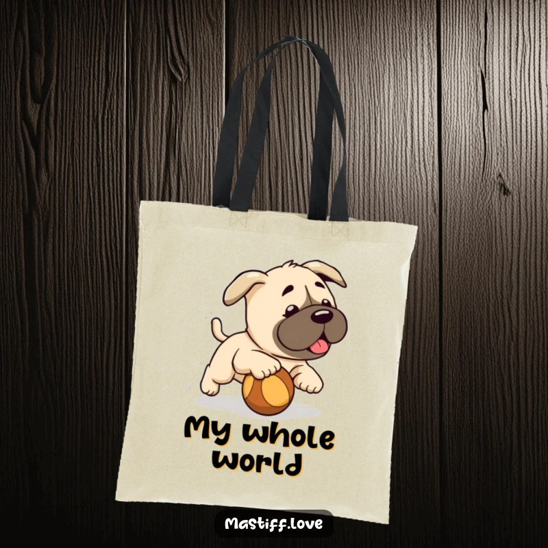 Funny cute mastiff puppy, enthusiastically chasing a rolling ball, a playful and funny tote bag.